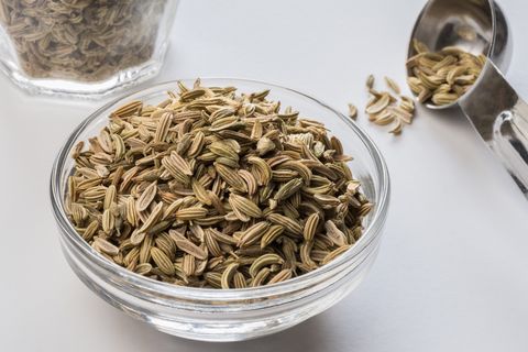 High Angle View Of Fennel Seeds In Bowl On White Table