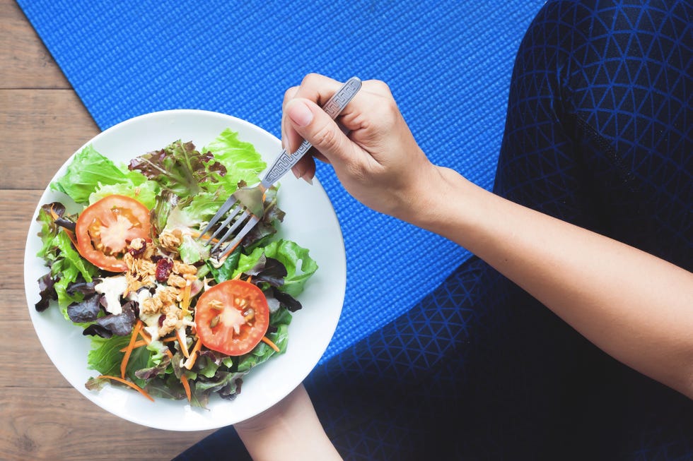 healthy dining out - High Angle View Of Hand Holding Food On Table
