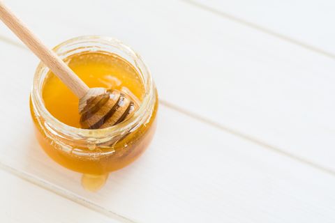 high angle view of honey in jar on table