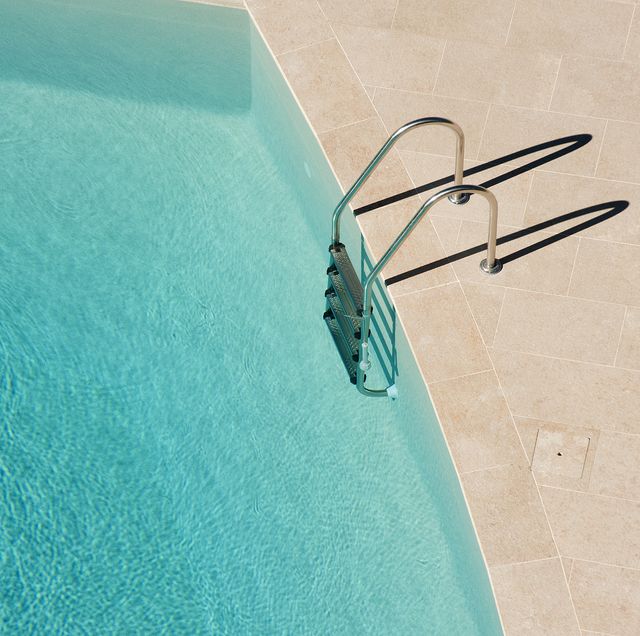 high angle view of ladder on swimming pool