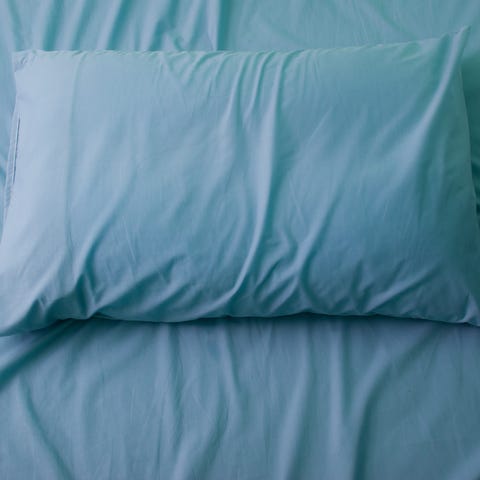 high angle view of pillow on bed