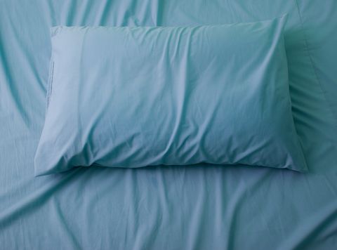 high angle view of pillow on bed