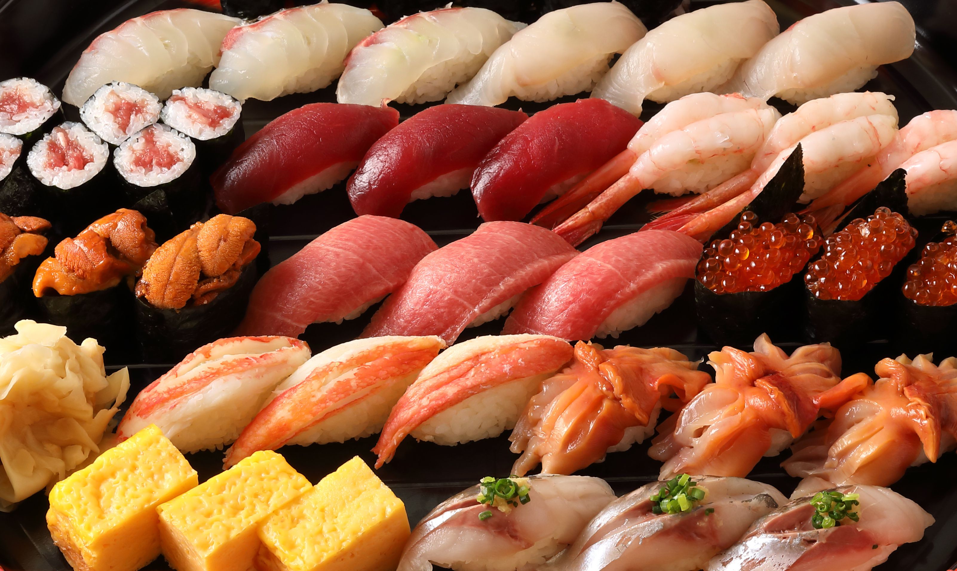 https://hips.hearstapps.com/hmg-prod/images/high-angle-view-of-seafood-in-plate-japan-royalty-free-image-1695925925.jpg