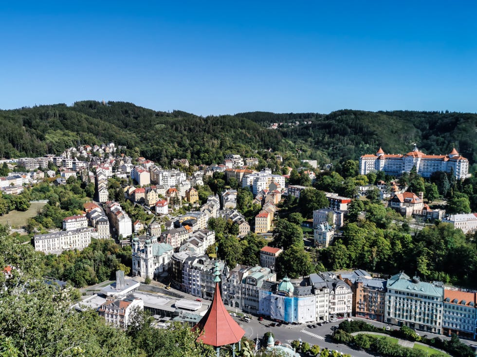 high angle view of townscape against clear blue sky