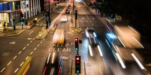 high angle view of traffic on a busy city street at night, london