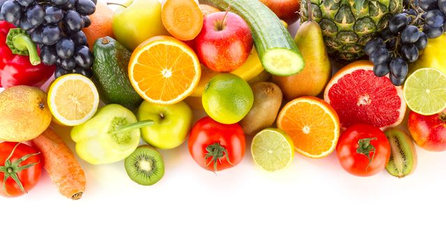 High Angle View Of Various Fruits And Vegetables On White Background