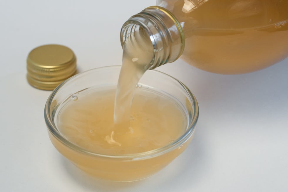 high angle view of vinegar in bowl over white background