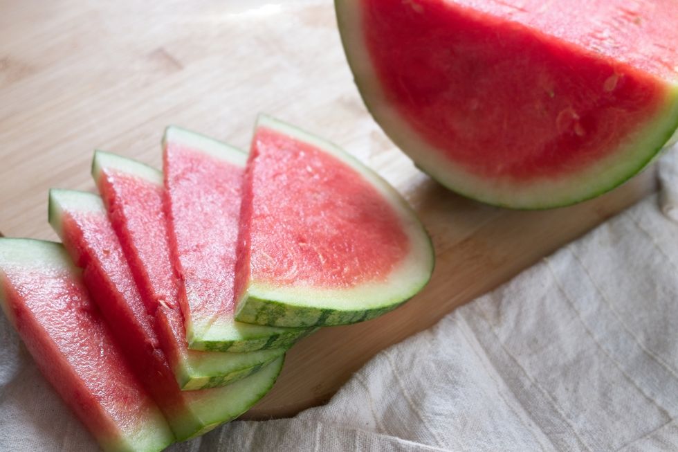High Angle View Of Watermelon Slices On Cutting Board