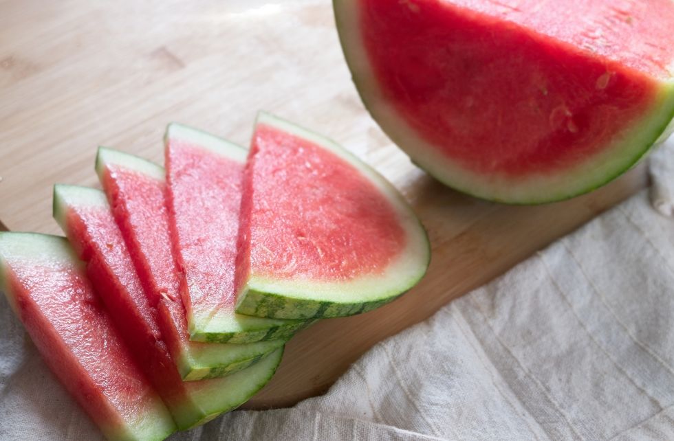 High Angle View Of Watermelon Slices On Cutting Board