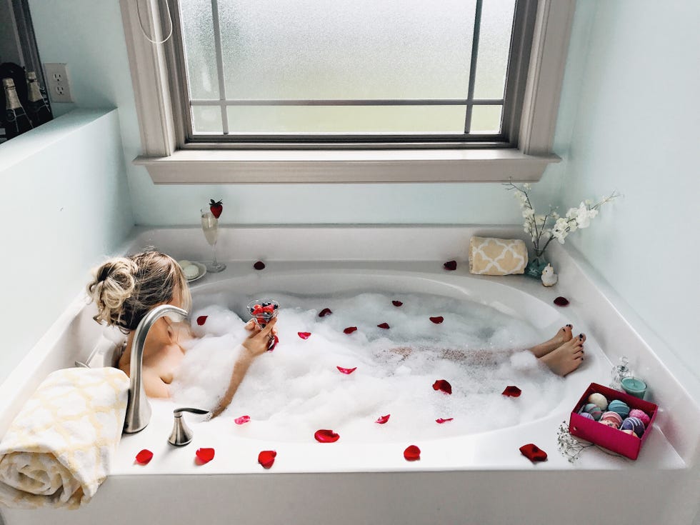 High Angle View Of Woman With Fruits In Glass Bathing In Tub