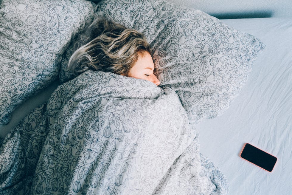 high angle view vie of woman sleeping on bed, running recovery