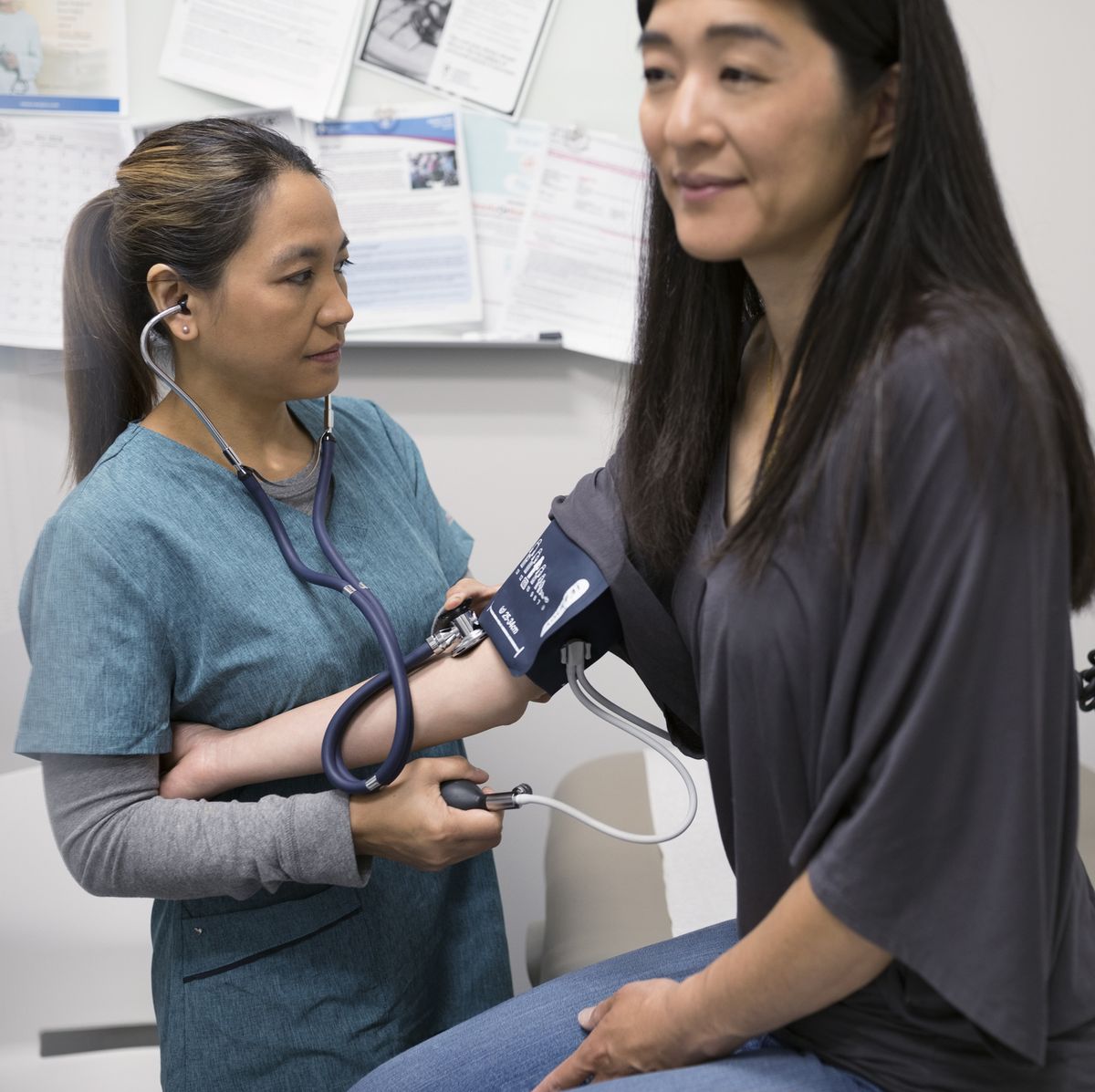 Woman getting her blood pressure read.