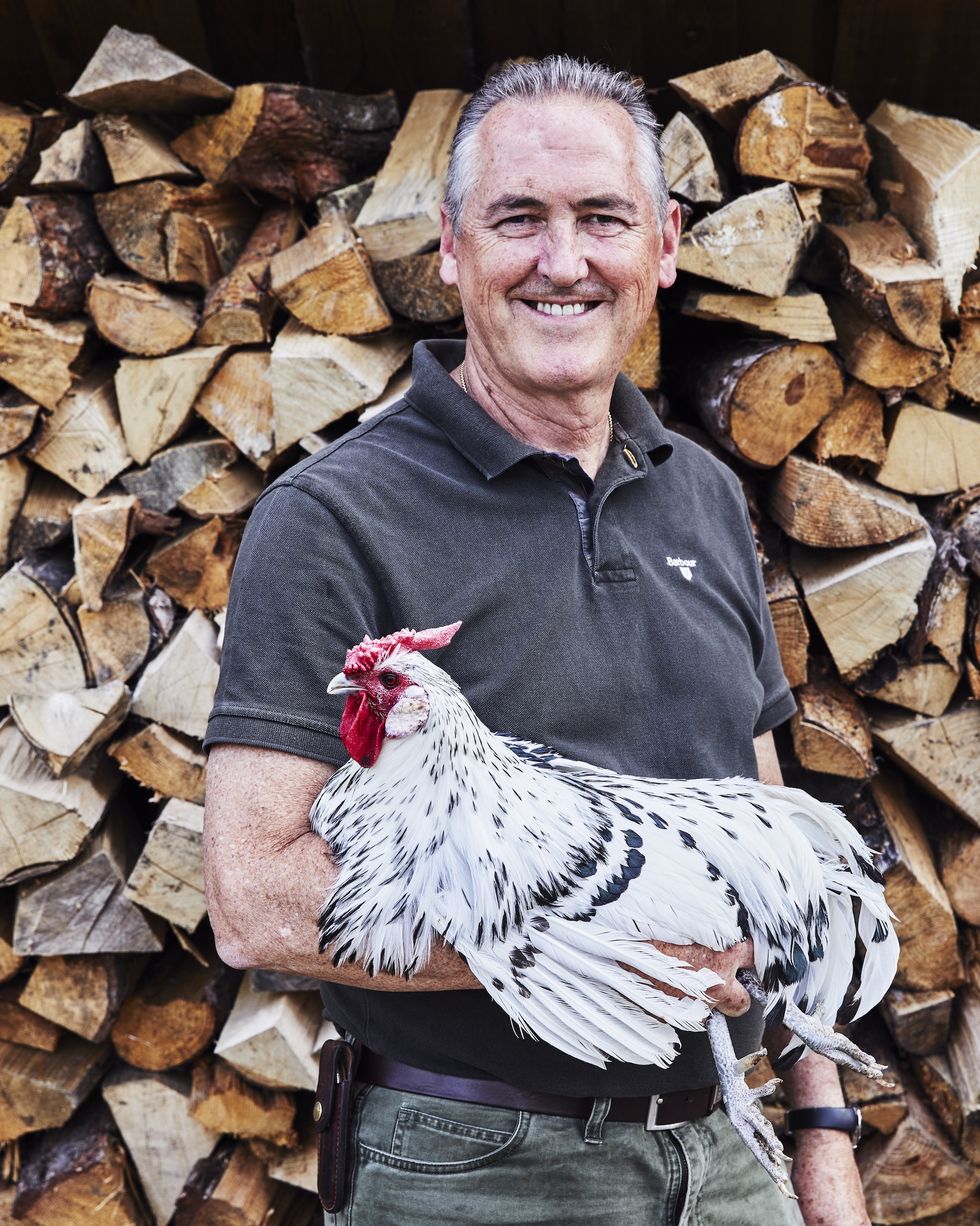 kirk robertson holding a rare hen