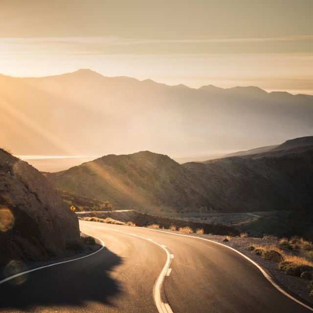 highway at sunrise, going into death valley national park