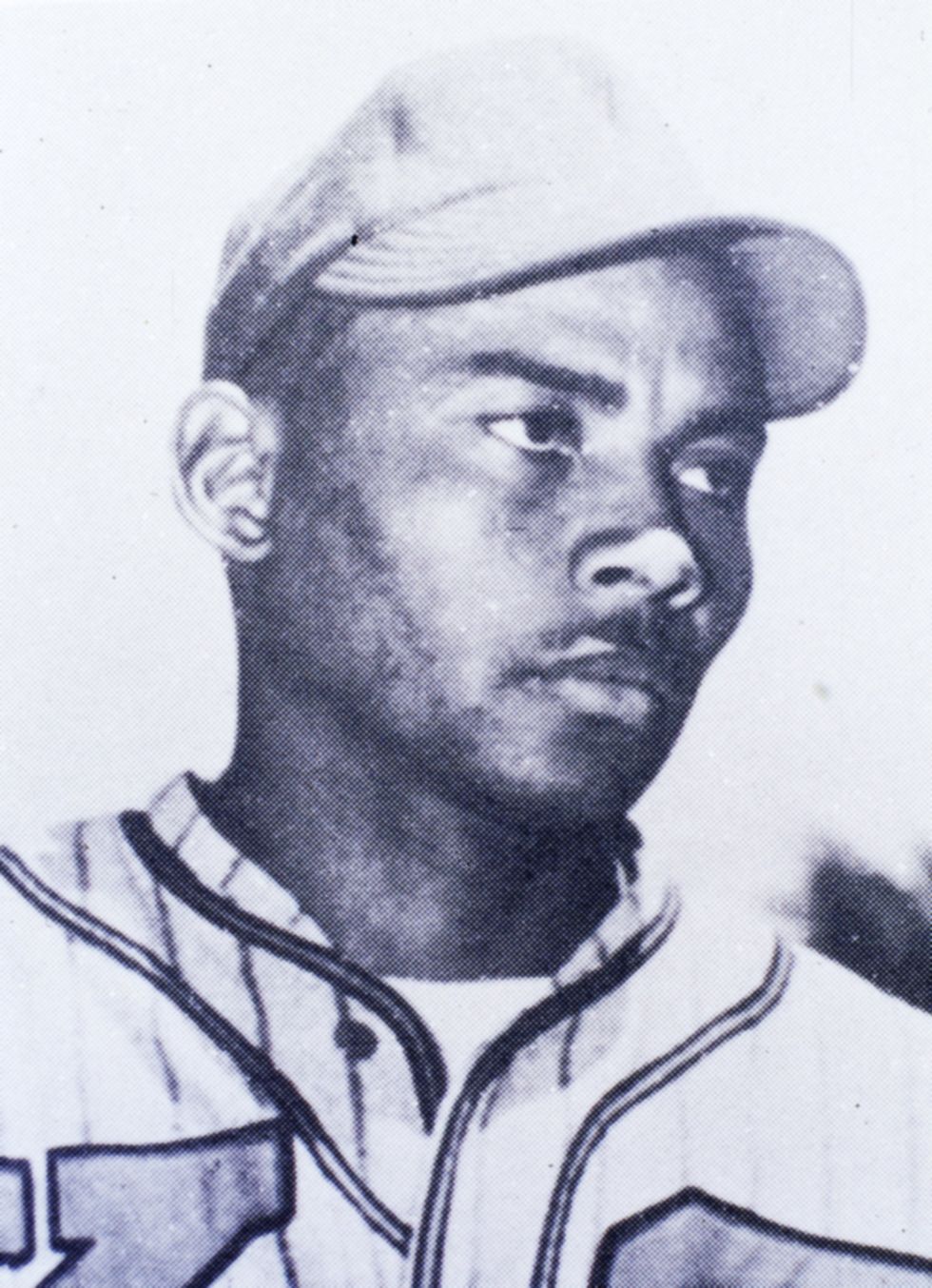 hilton smith looking on while wearing his baseball uniform