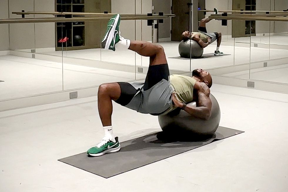exercise ball workout, hip thrust hold with march