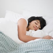 woman sleeping in bed how to sleep better