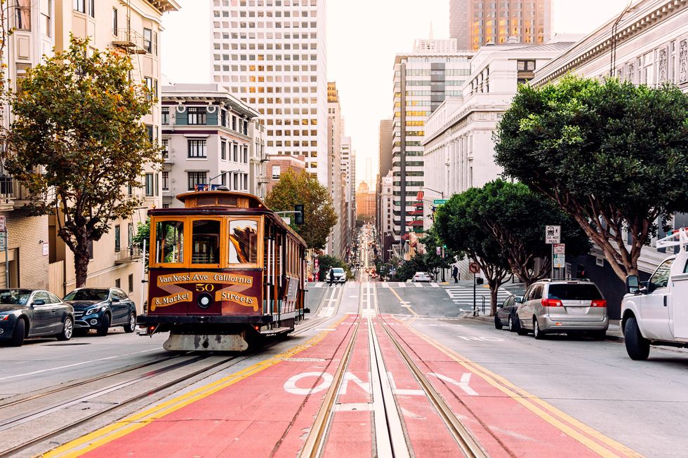 historic cable car on the street in san francisco, california, usa