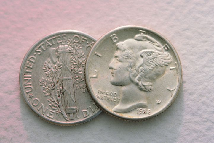 mercury dime shows liberty personified on the front and a fasces or bundle of sticks containing an axe on the back