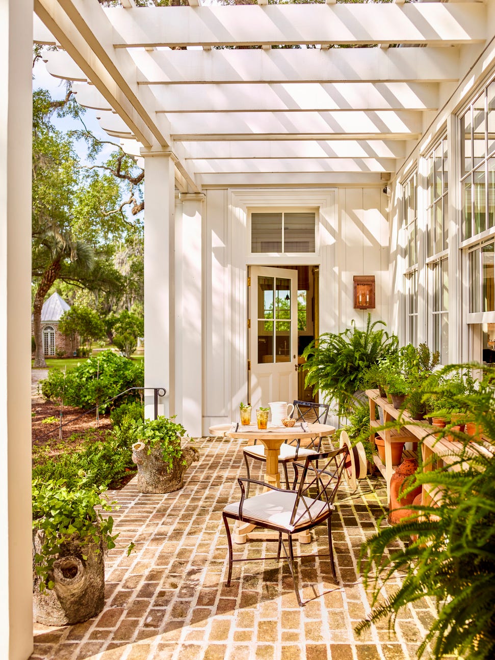 pergola covered brick patio