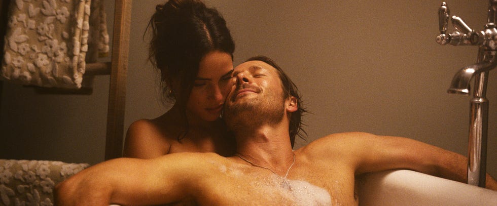 adria arjona and glen powell in netflix movie hit man