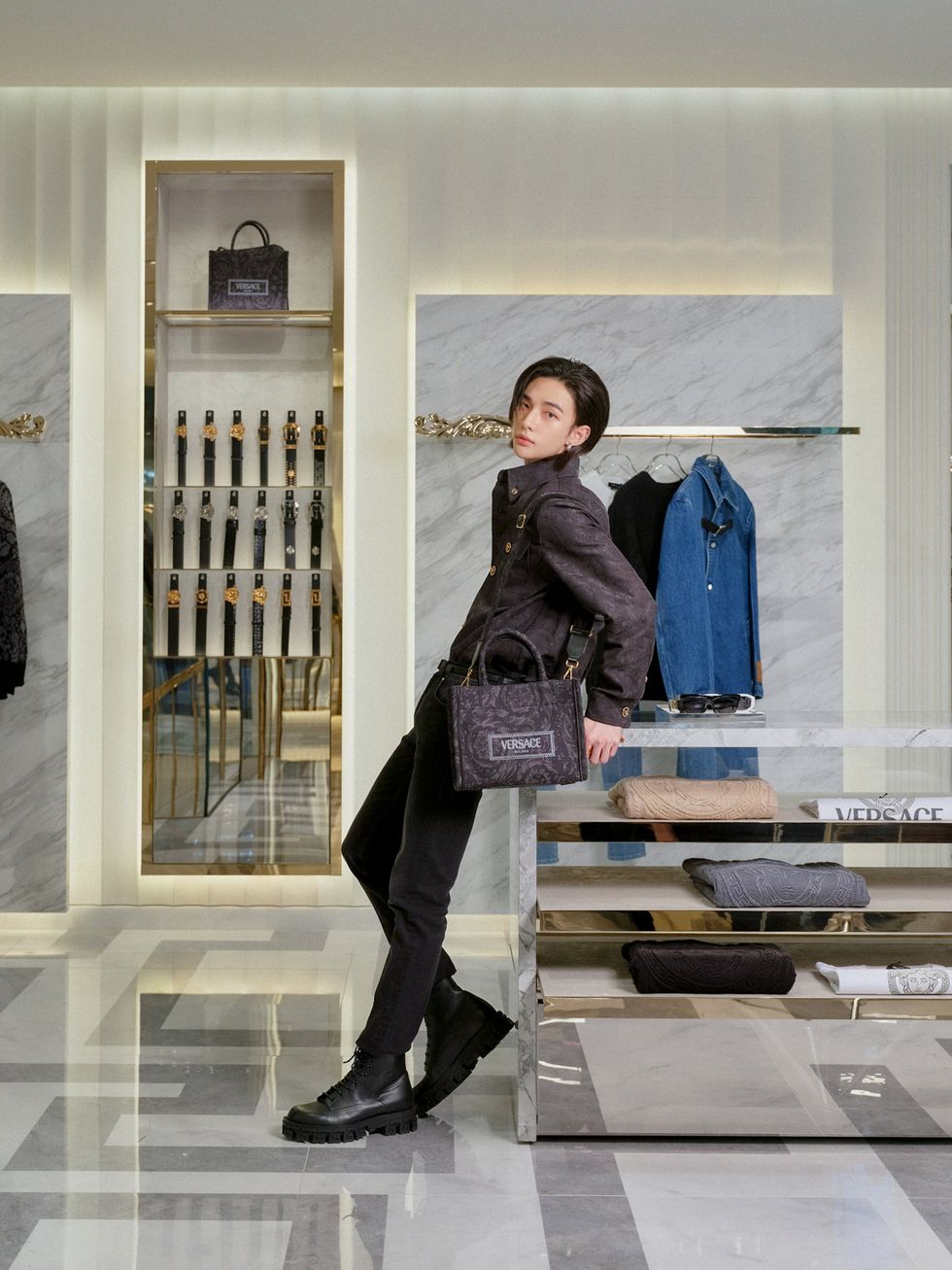 a person standing in front of a display case
