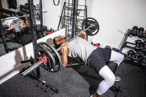 franklin lakes, nj, october 27, 2021   former nfl player and tv sports broadcaster nate burleson working out in his basement gym at home photos by lanna apisukh