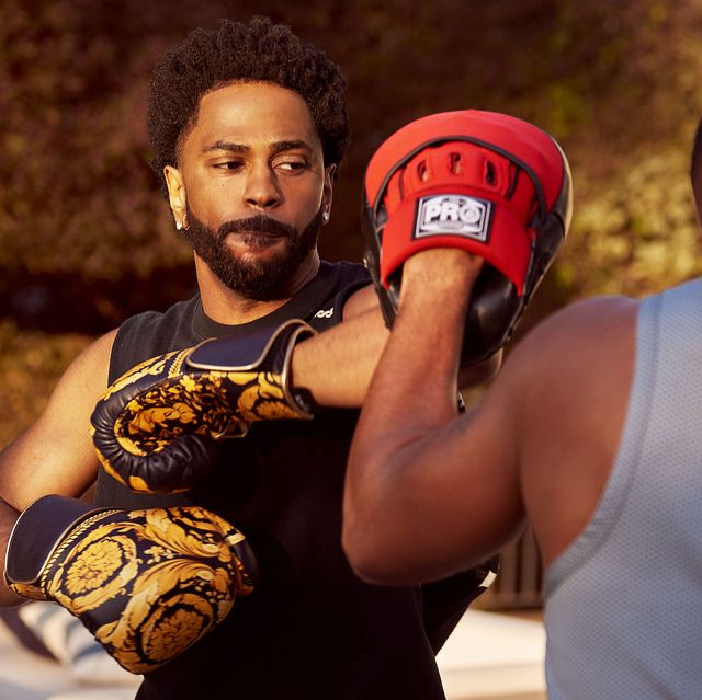 Boxing glove, Professional boxer, Boxing, Striking combat sports, Contact sport, Professional boxing, Boxing equipment, Individual sports, Sports, Combat sport, 
