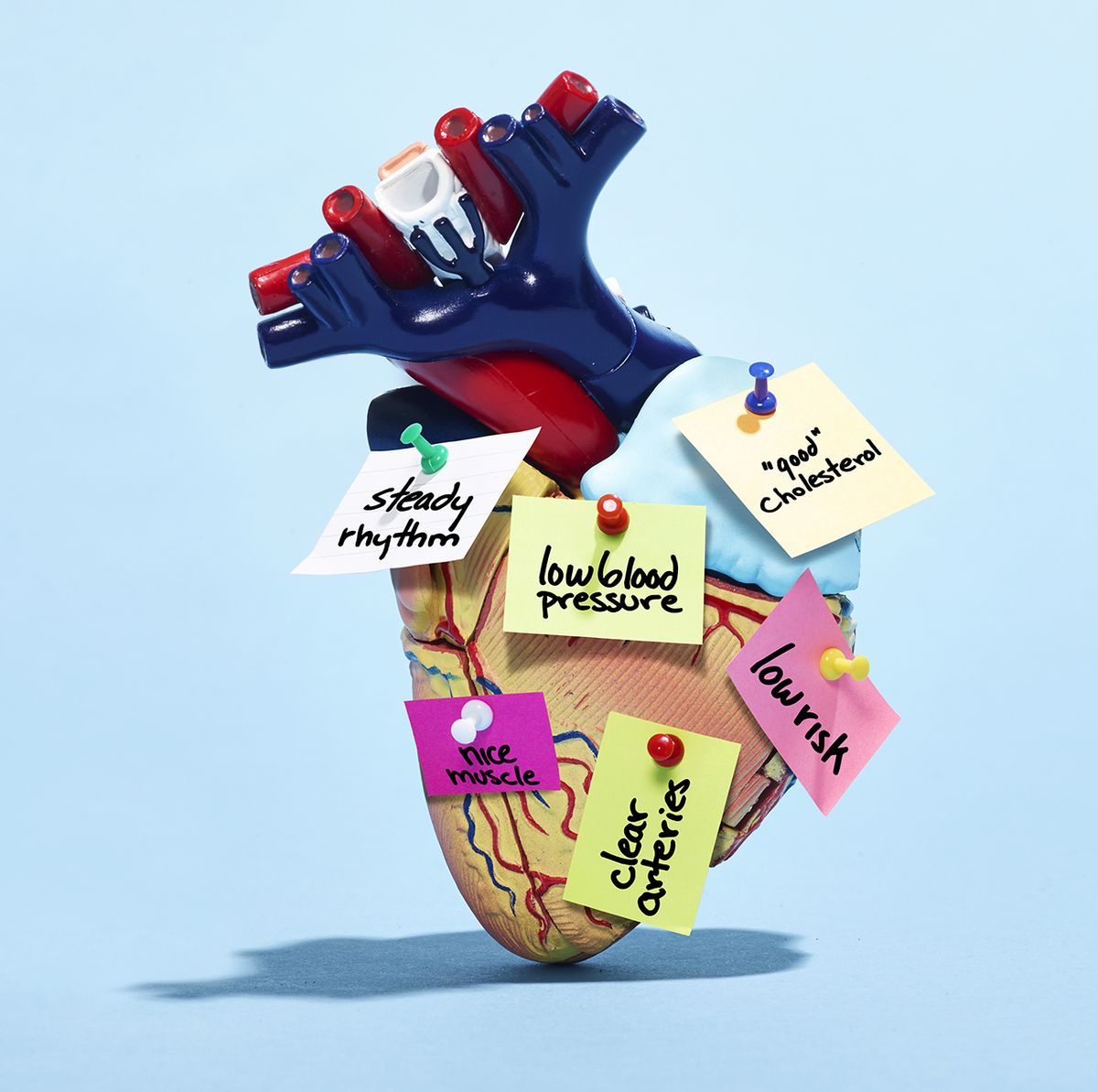 heart illustration pinned with lots of work demands on sticky notes