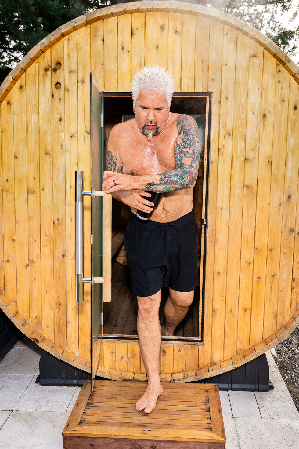 guy fieri exitng his sauna