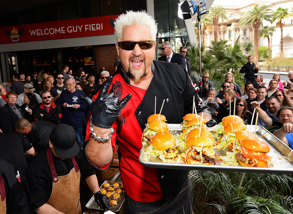 fieri slinging burgers at the april 2014 opening of his vegas kitchen bar at what is now the linq there are three salads on its menu﻿﻿