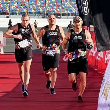 three men running