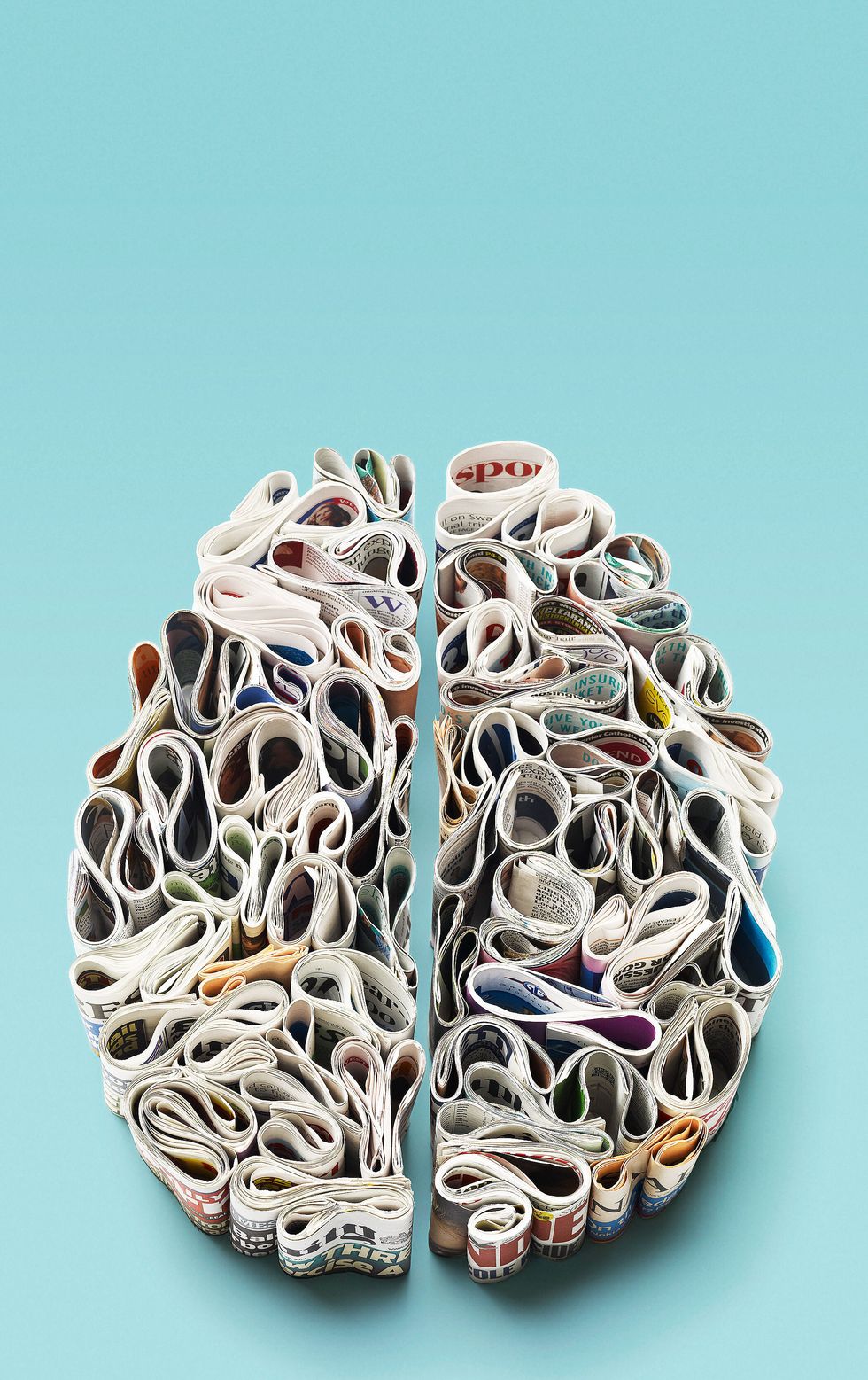 brain made out of rolled up newspapers
