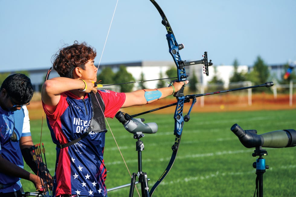 jin kang, archery, regis high school, new york city.