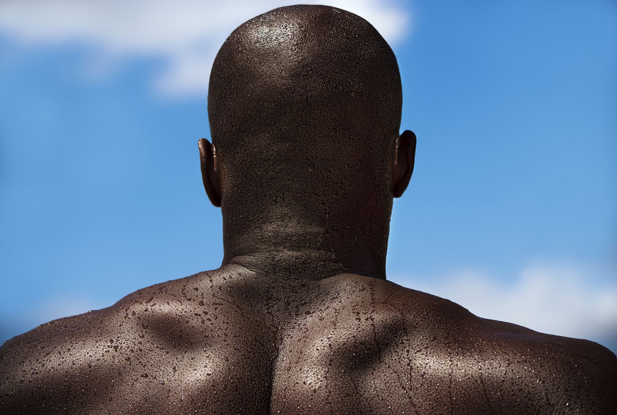 african american male athlete photographed from behind at a low angle