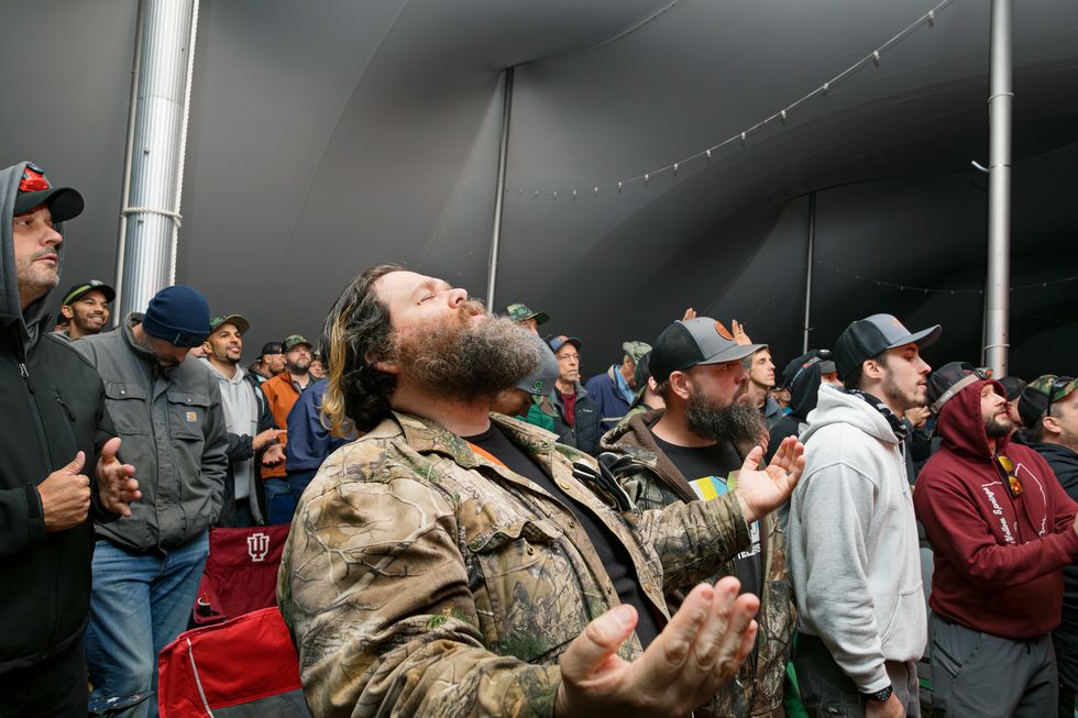 a man camper experiences a sacred moment under the big tent