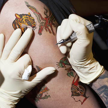 Dennis Rodman Gets Face Tattoo of Girlfriend Yella Yella