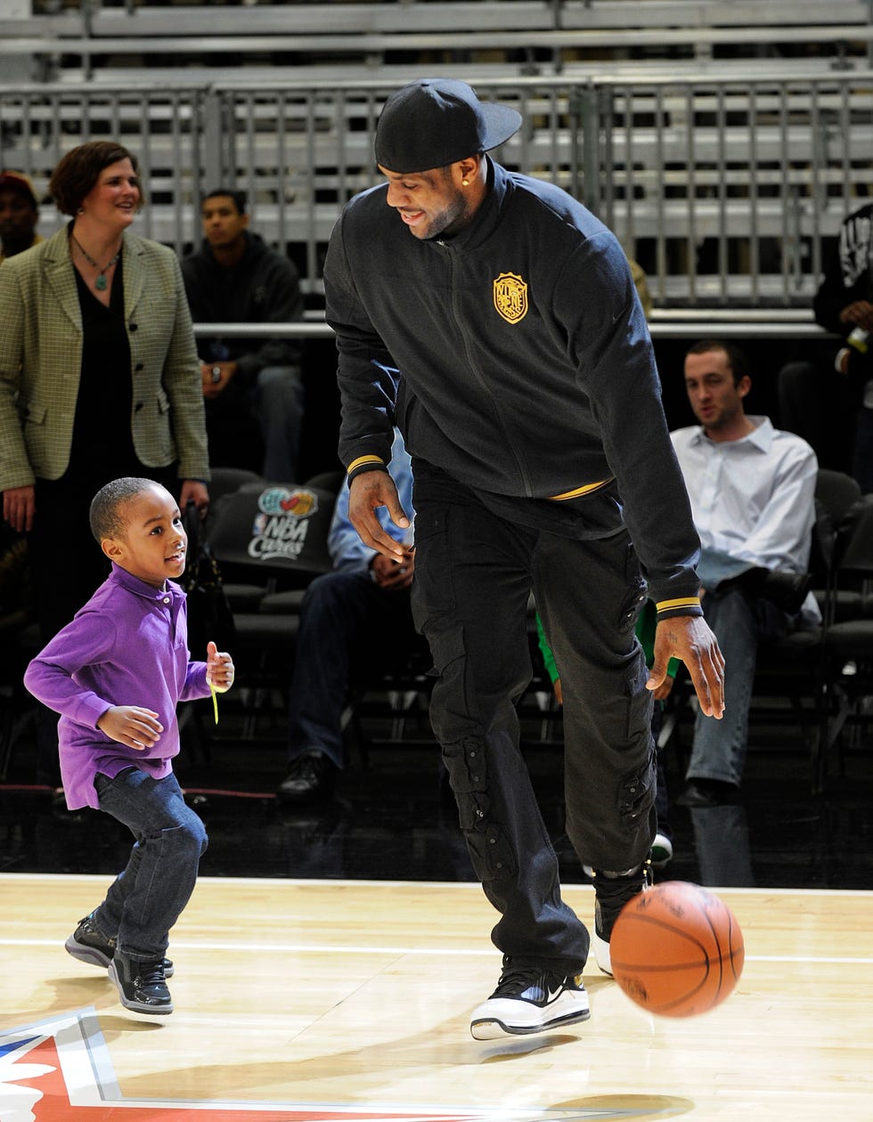 dallas february 12 l r lebron james jr and nba player lebron james shoot the ball during the nba all star celebrity game presented by final fantasy xiii held at the dallas convention center on february 12, 2010 in dallas, texas photo by jason merrittgetty images