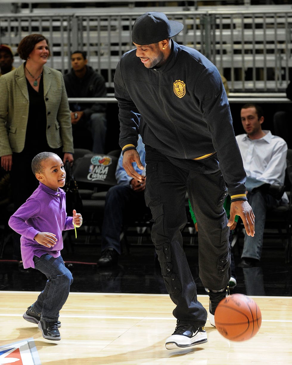 dallas february 12 l r lebron james jr and nba player lebron james shoot the ball during the nba all star celebrity game presented by final fantasy xiii held at the dallas convention center on february 12, 2010 in dallas, texas photo by jason merrittgetty images
