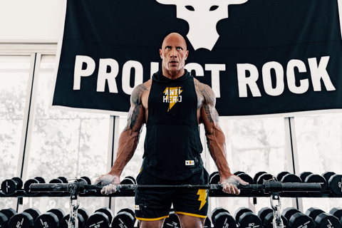 the rock lifting weights
