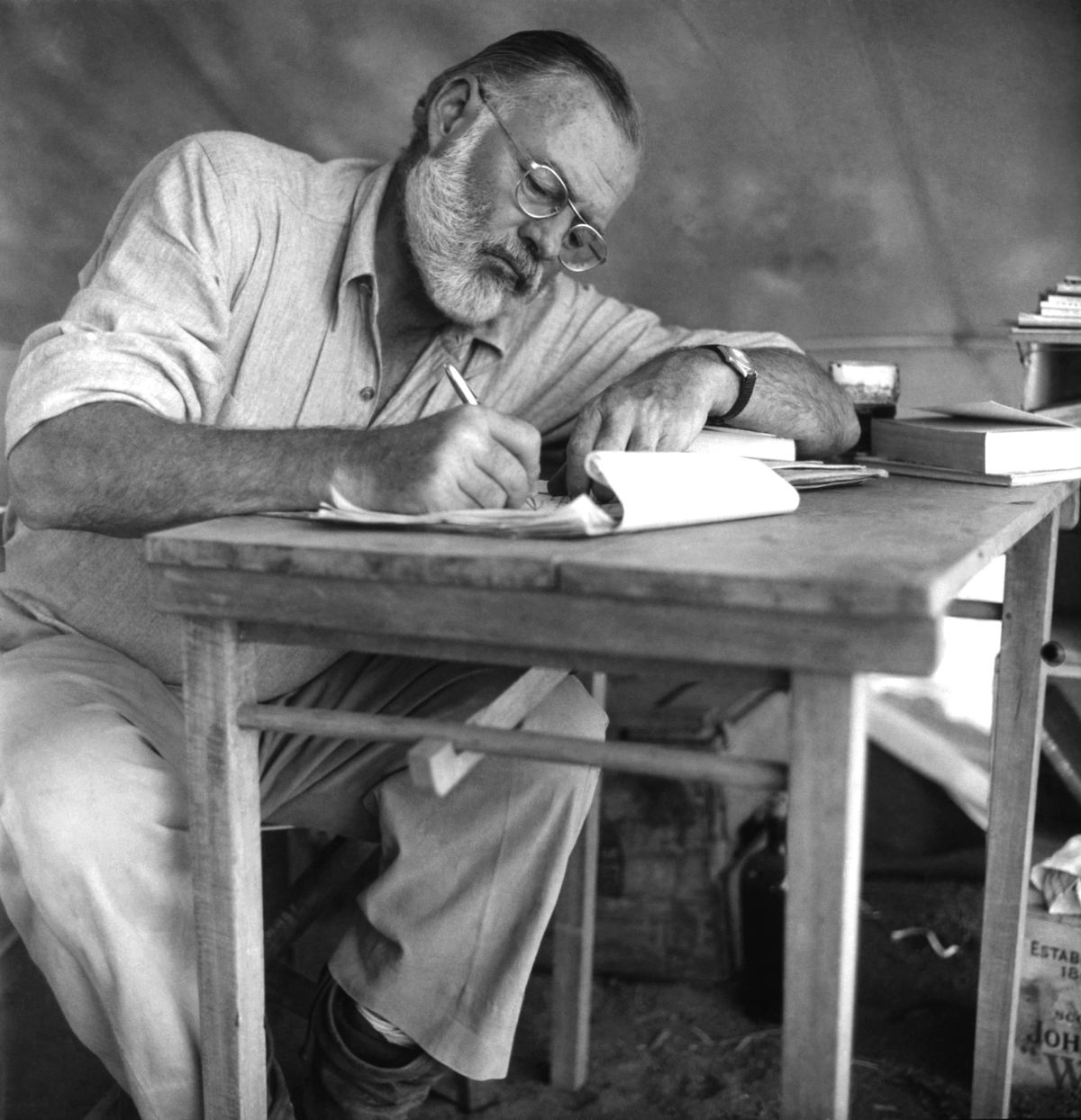 american writer ernest hemingway 1899   1961 working at a portable table while on a big game hunt in kenya, september 1952  photo by earl theisengetty images