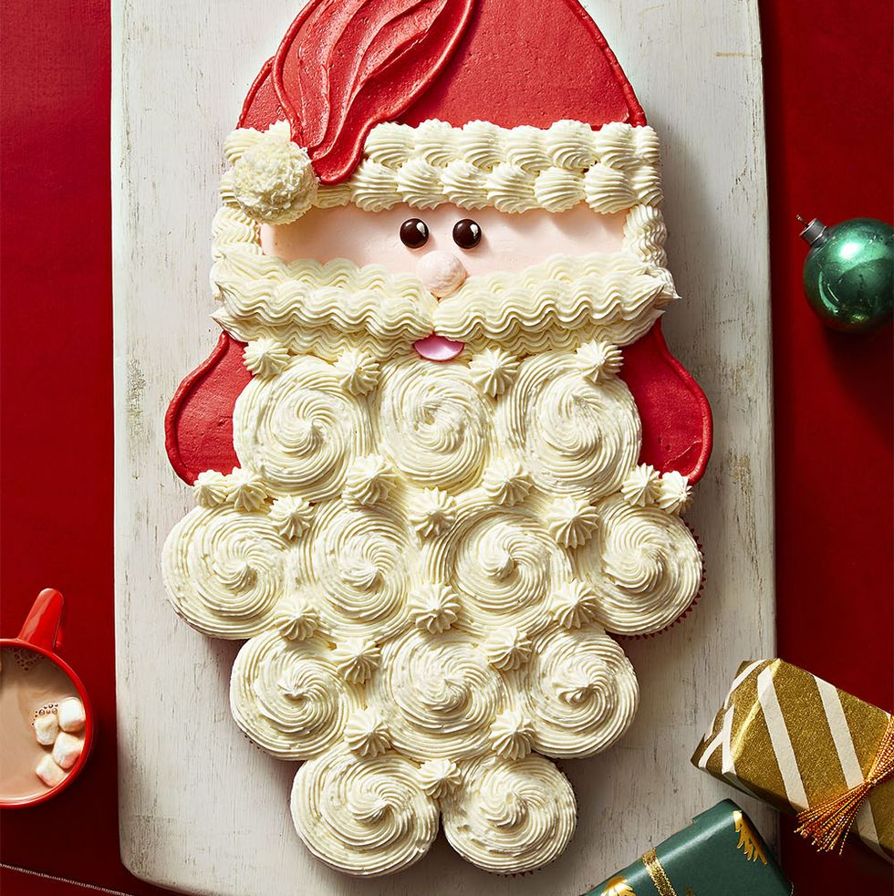 mr claus pull apart cupcakes on white wood board