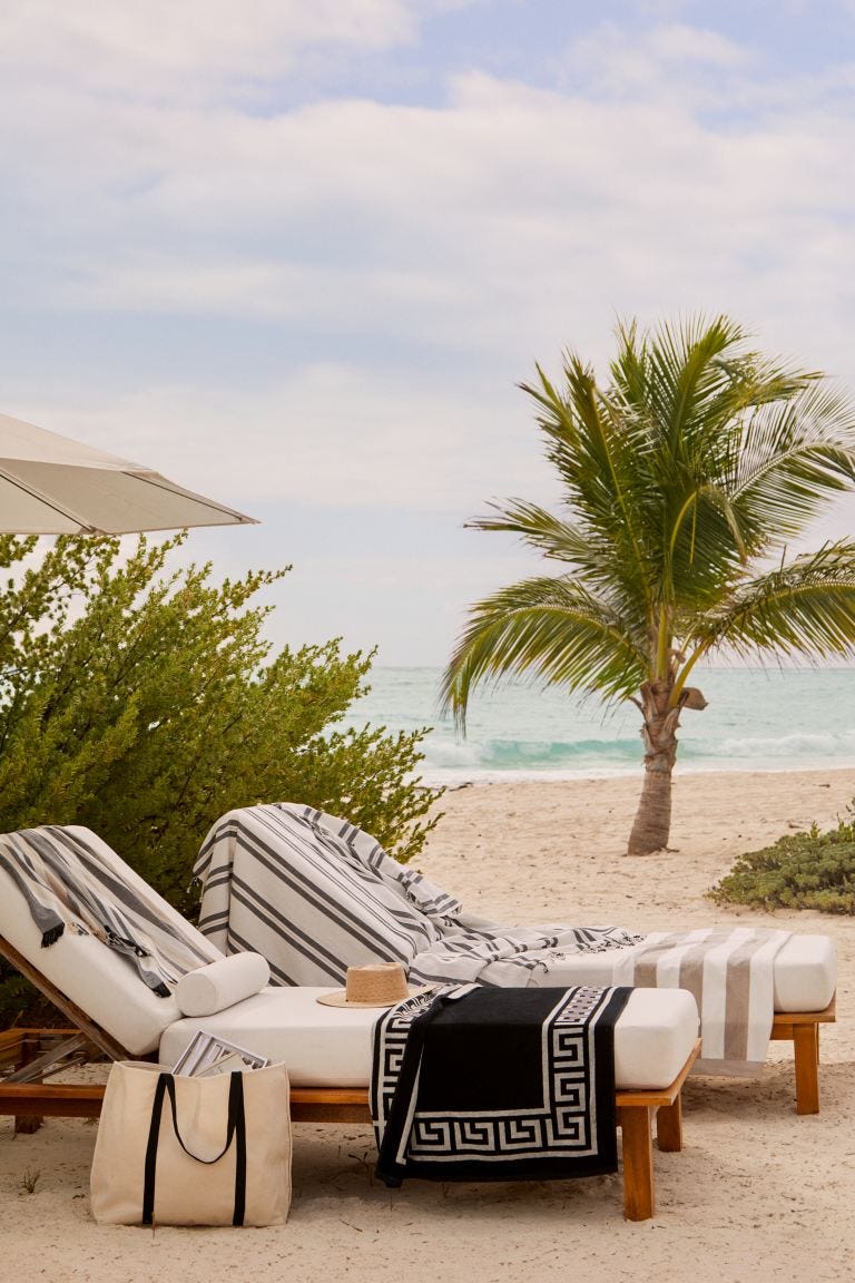 a lounge chair on a beach