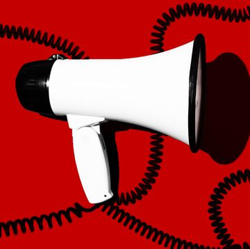 megaphone on red background with black coils