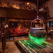hocus pocus themed living room with cauldron