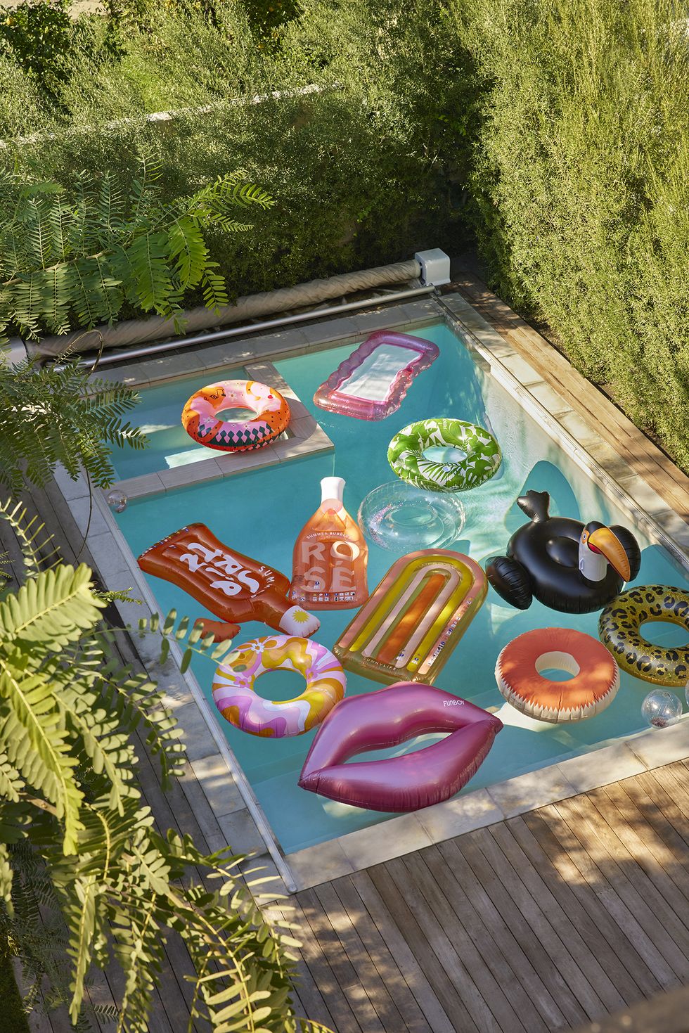 a pool with quirky floats in it