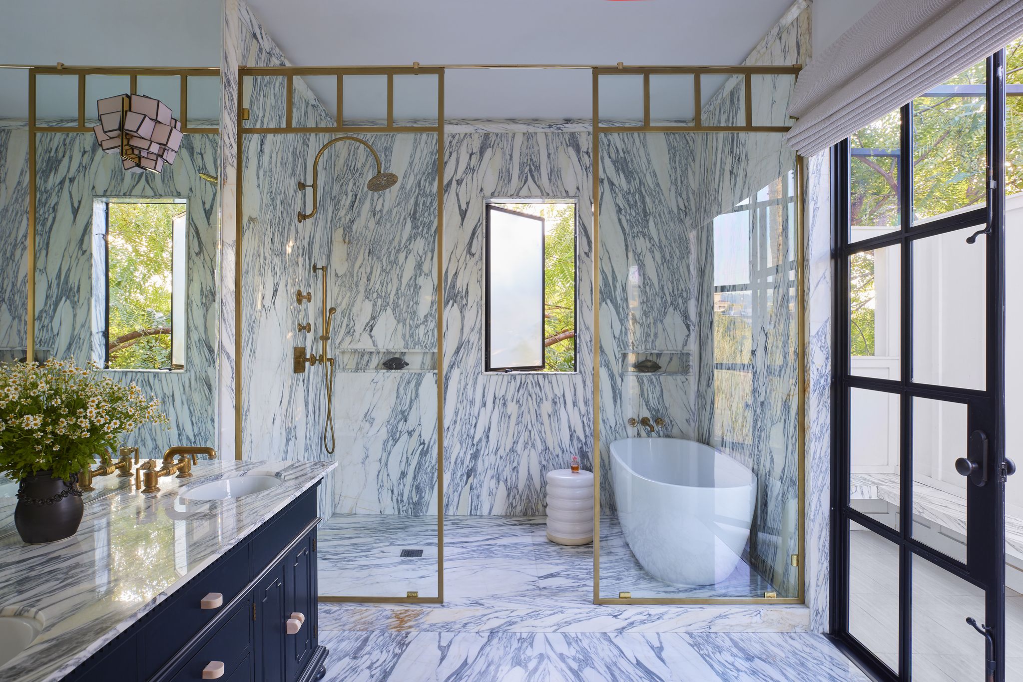 bathroom with marble floors and wall