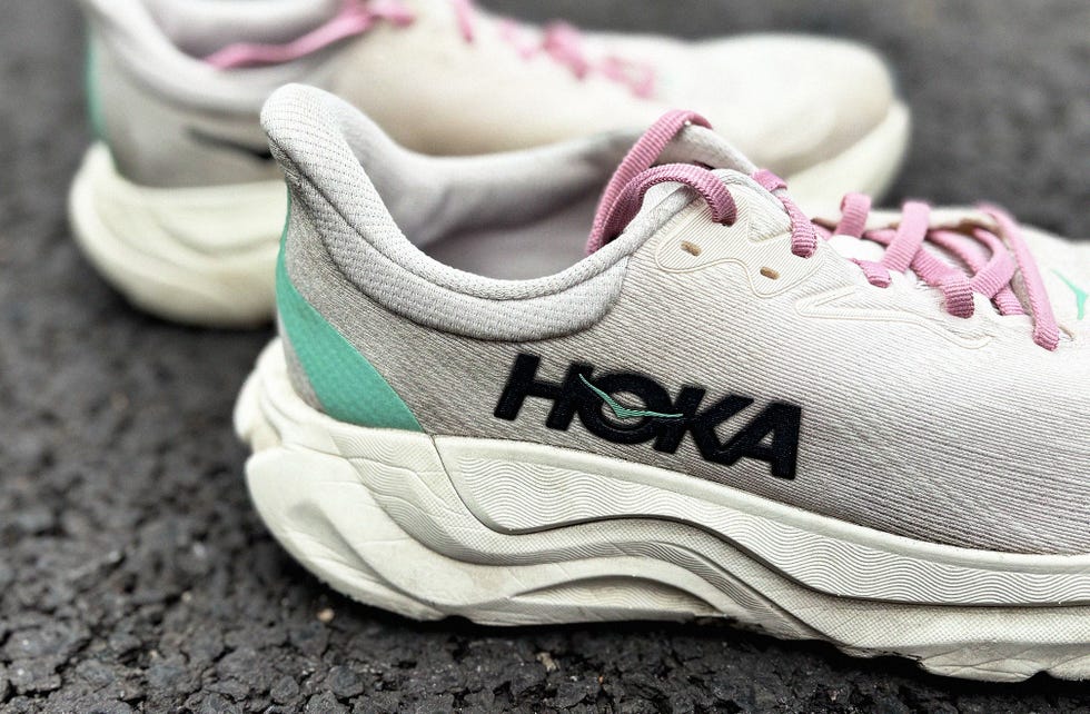 a close up of a cushioned running shoe