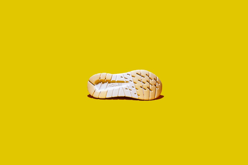 Yellow, Footwear, Font, Shoe, Logo, Illustration, 