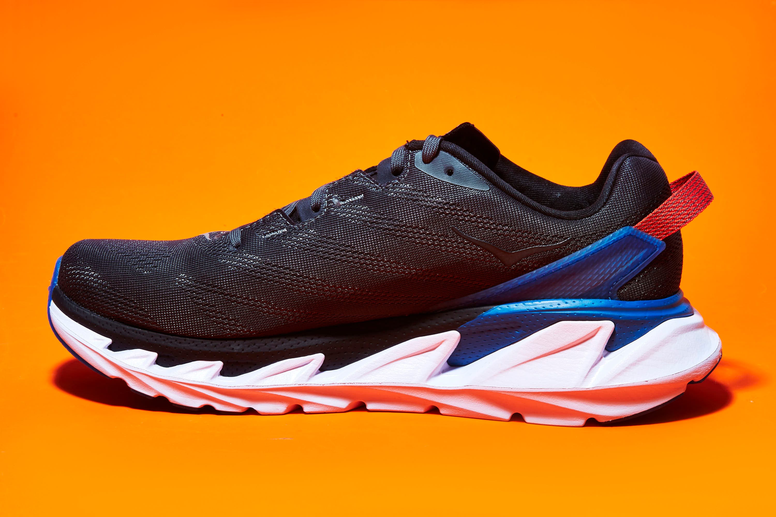 Shoe, Footwear, Running shoe, Orange, Walking shoe, White, Outdoor shoe, Blue, Cross training shoe, Sportswear, 